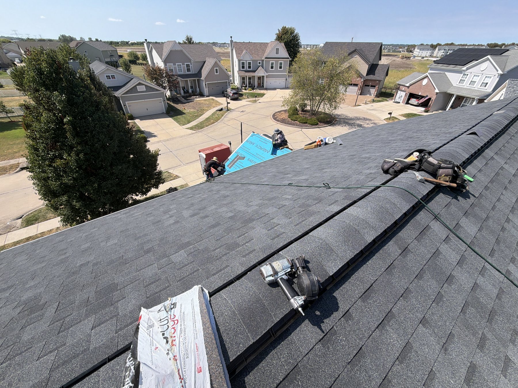 Ridge vent going on during a Keys Roofing install